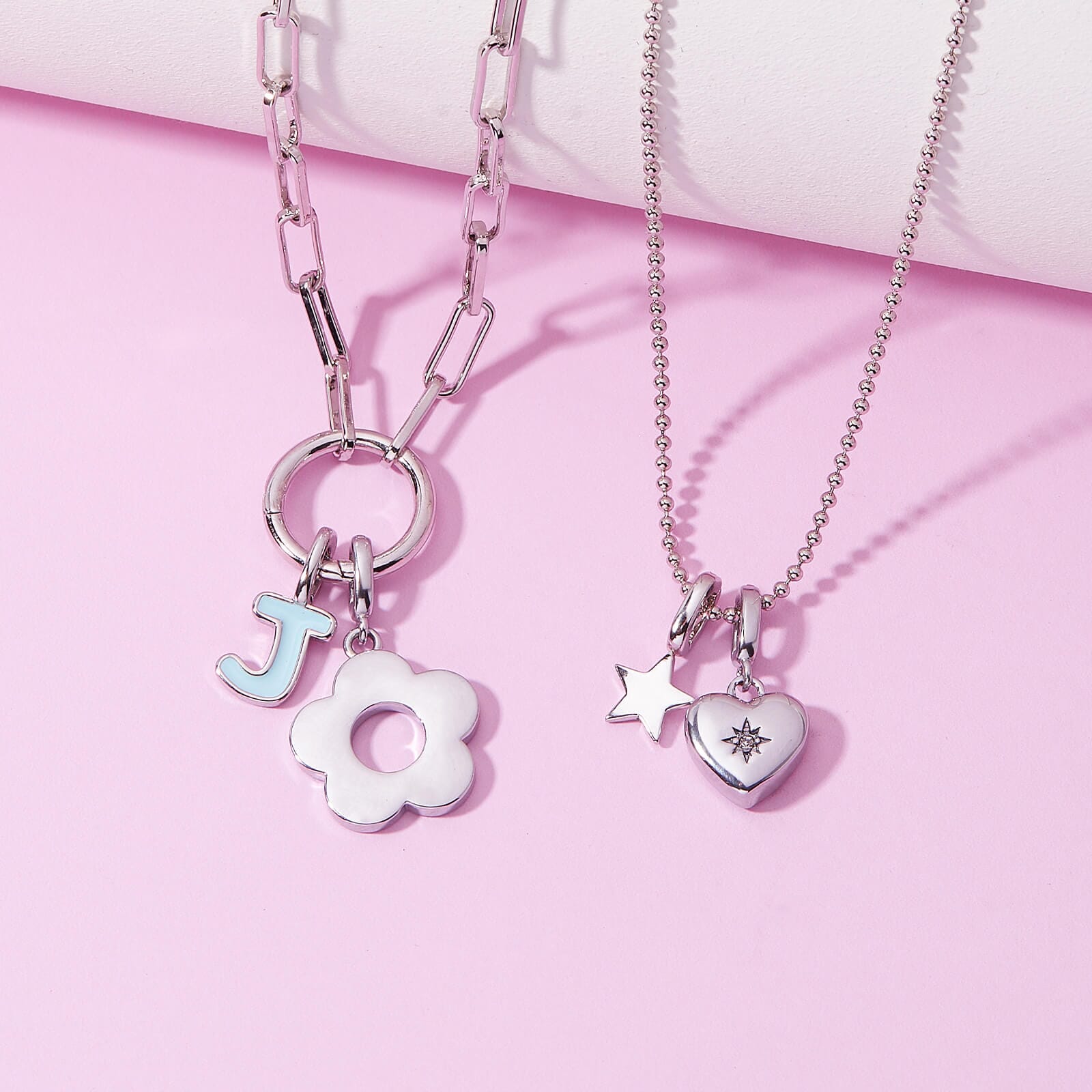 Harper Starburst Heart Charm