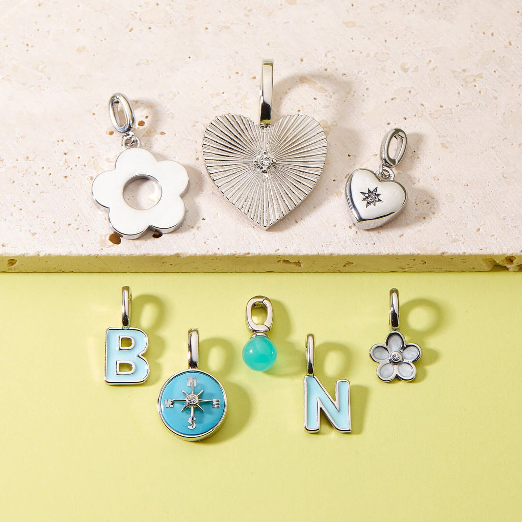 Harper Starburst Heart Charm